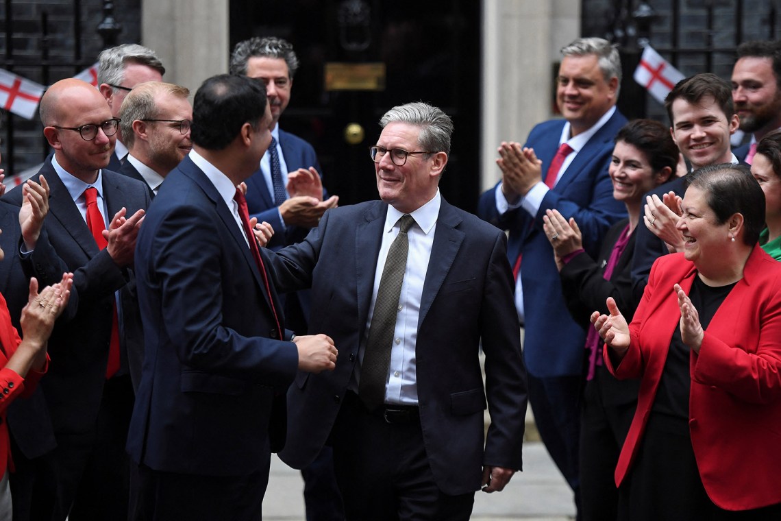 British prime minister Keir Starmer greeting Scottish Labour MPs outside 10 Downing Street