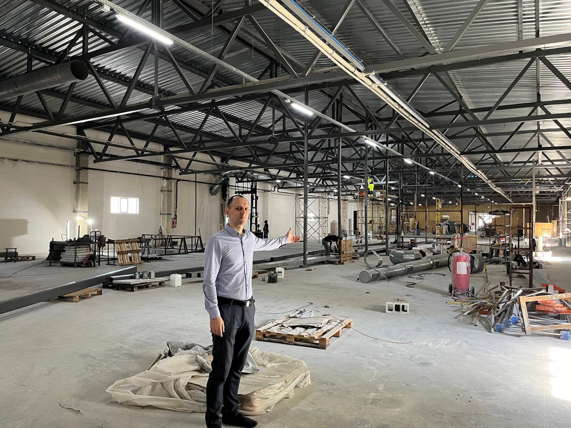 Andriy, a production manager at Factor Druk, in the newly reconstructed printing plant, Kharkiv