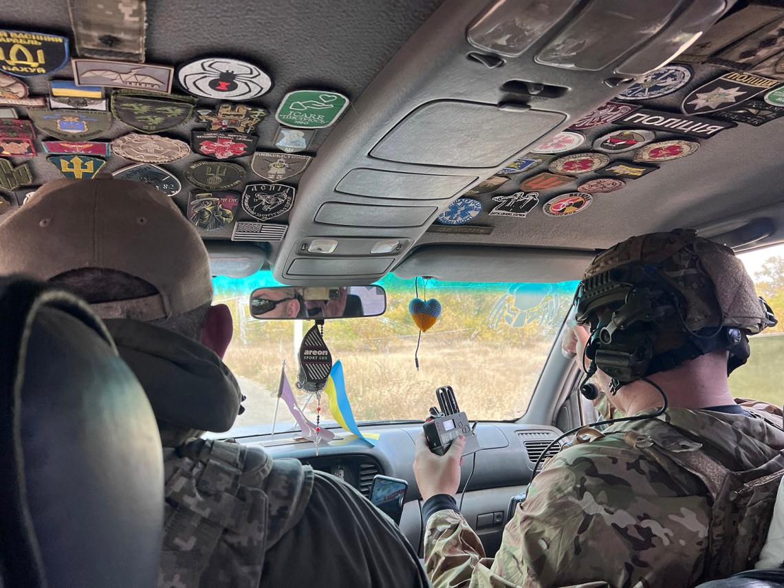 Ukrainian soldiers with a handheld drone warning system, near Vovchansk, Ukraine